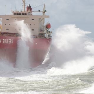 The ship was stuck fast and stormy seas were driving it harder onto the sand.